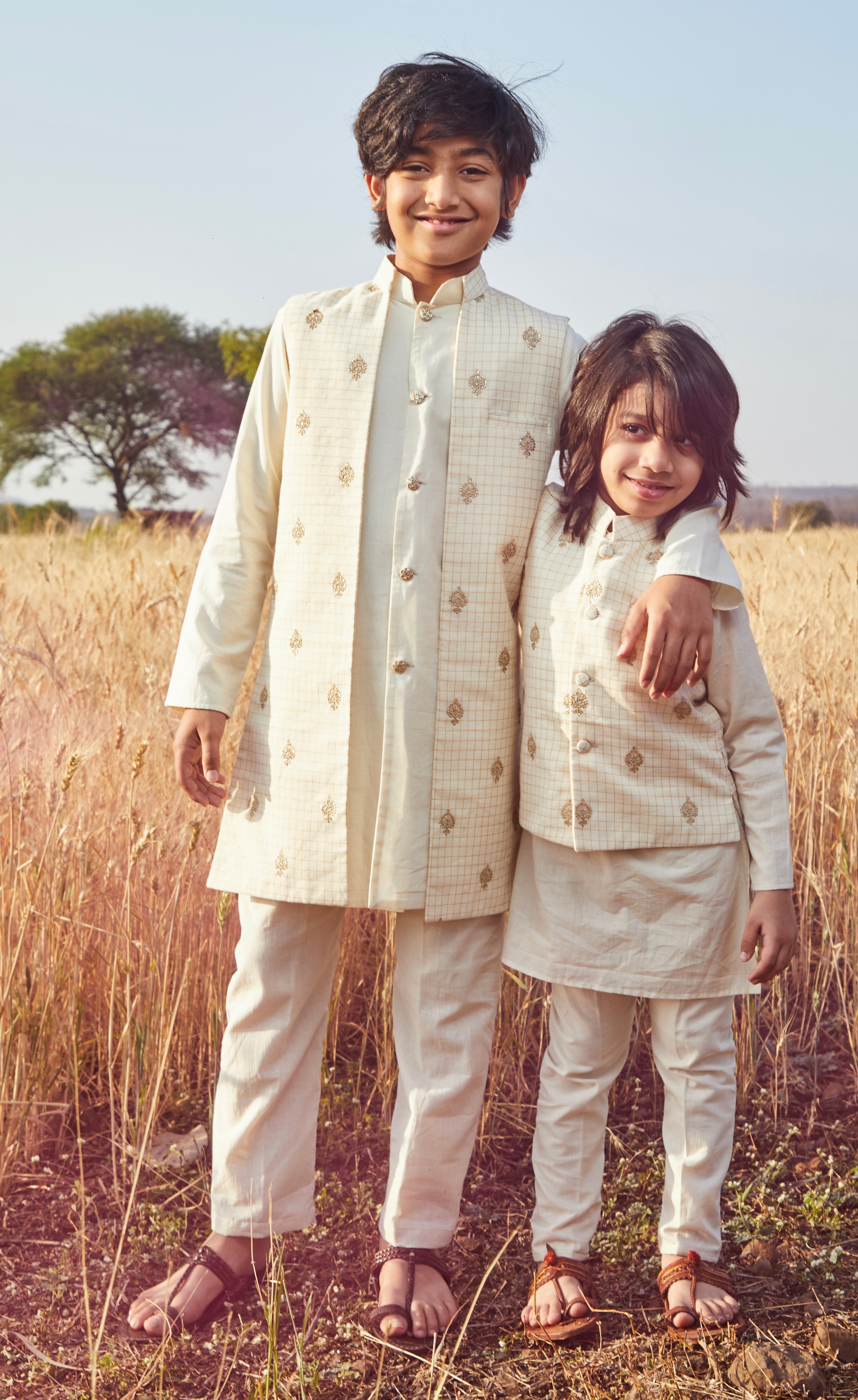 Off White Embroidered Kurta And Long Jacket Set